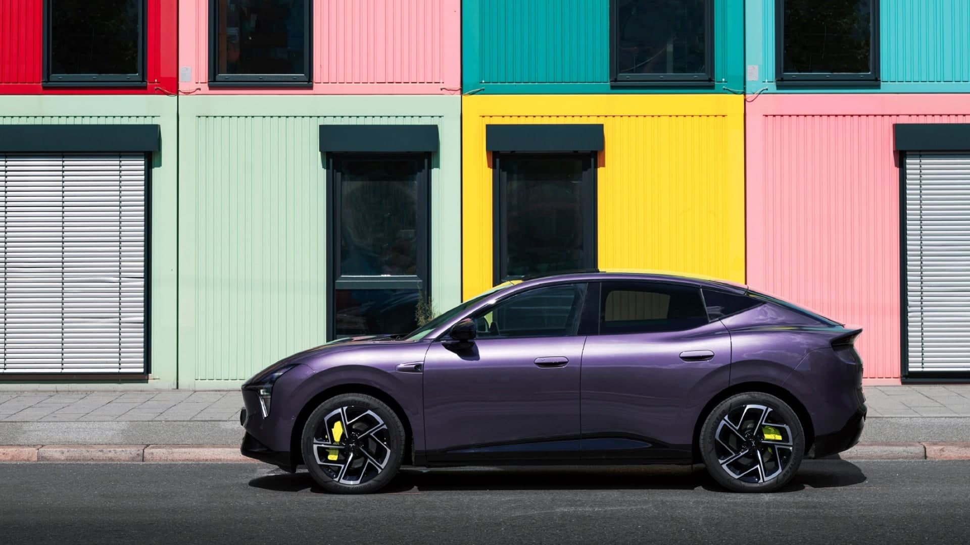 Xpeng L03 in Phantom Purple, parked streetside profile shot